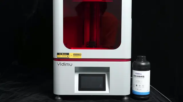 YIDIMU dental resin 3D printer with finished dental models in a bright digital dental laboratory